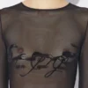 El top «Tattoo Ruban» flocado El top «Tattoo Ruban» flocado