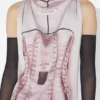 El vestido drapeado con efecto óptico de Corsés El vestido drapeado con efecto óptico de Corsés