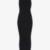 El vestido negro con detalle de piercing El vestido negro con detalle de piercing