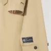 La gabardina con capucha La gabardina con capucha