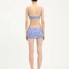 La minifalda azul con estampado de dianas